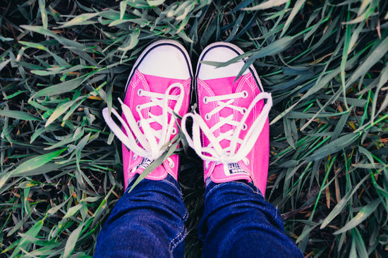 canva-person-wearing-pair-of-pink-converse-all-star-low-top-sneakers-MADGydO195w