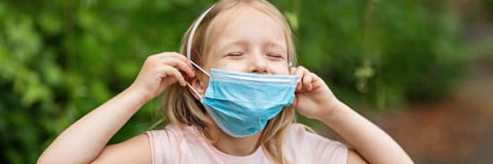 canva-little-girl-taking-off-protective-medical-mask-outdoors-MAEO9nNP7WE
