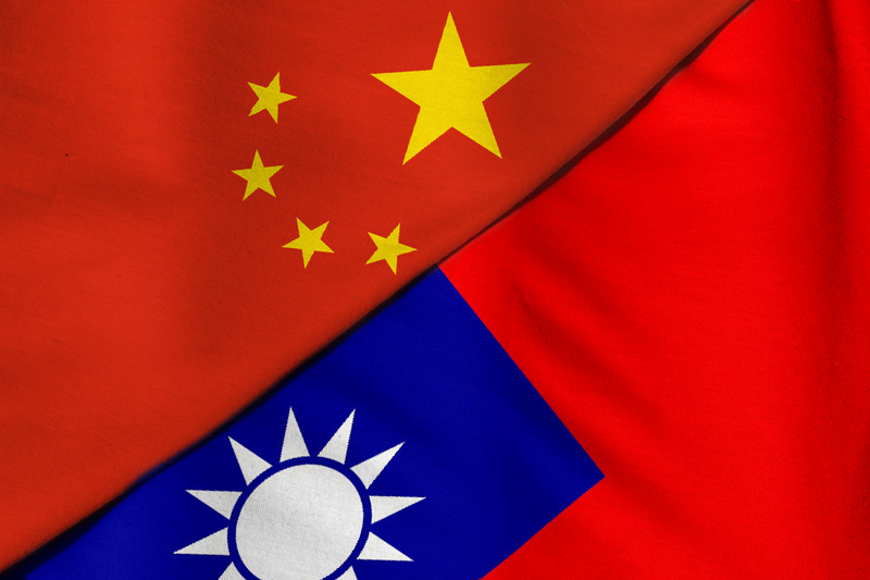 Two flags. People’s Republic of China and Taiwan.